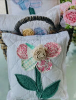 Flower quilted pillow